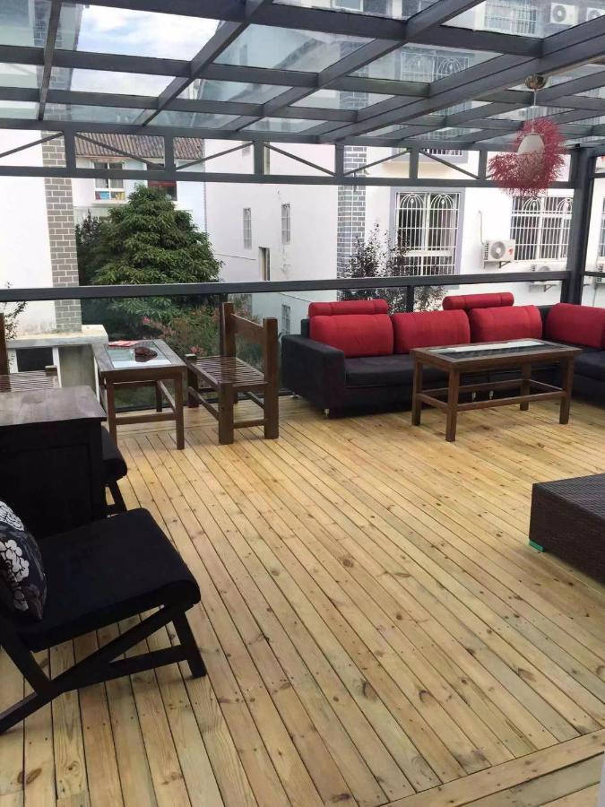 Mama Naxi Guesthouse Лиджанг Екстериор снимка