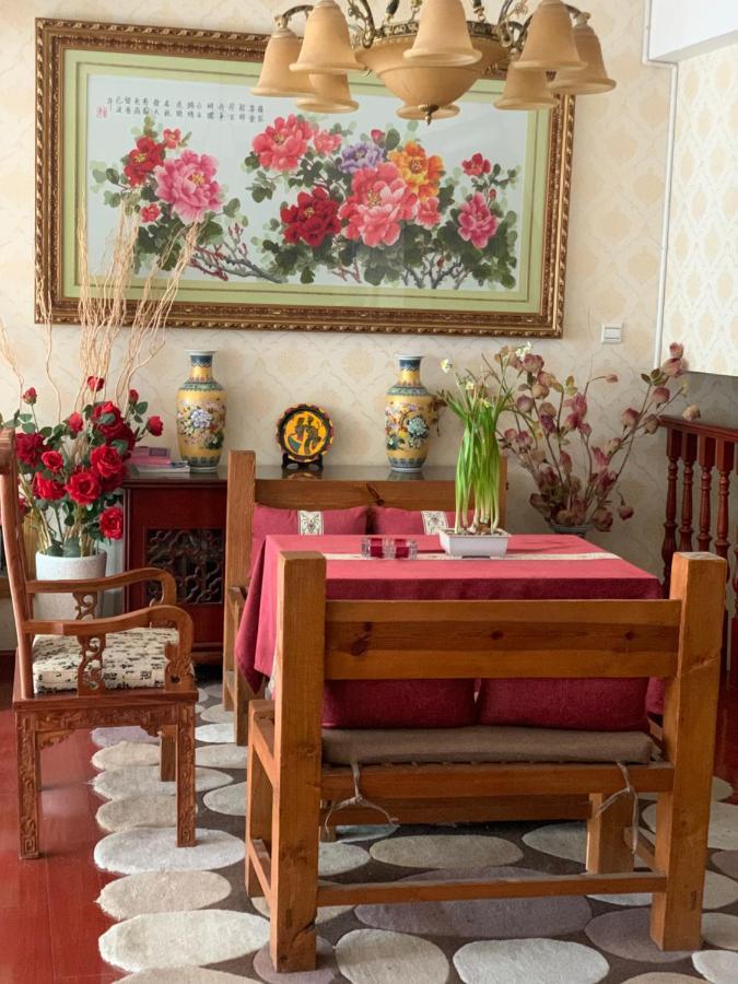 Mama Naxi Guesthouse Лиджанг Екстериор снимка