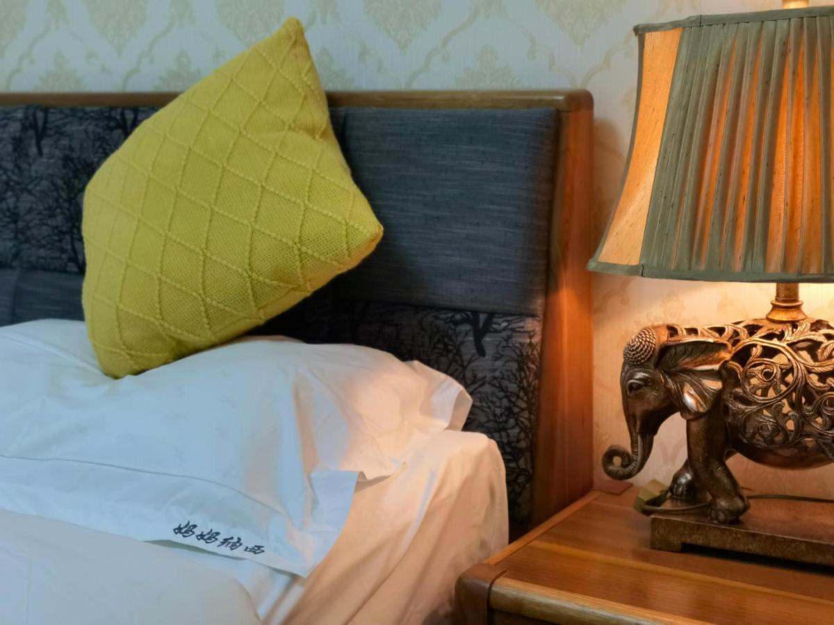 Mama Naxi Guesthouse Лиджанг Екстериор снимка