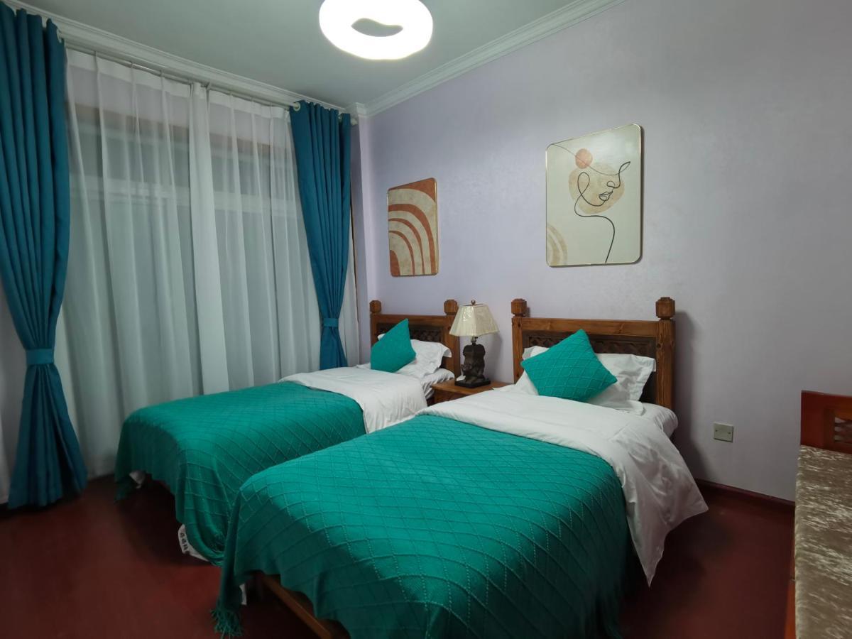 Mama Naxi Guesthouse Лиджанг Екстериор снимка