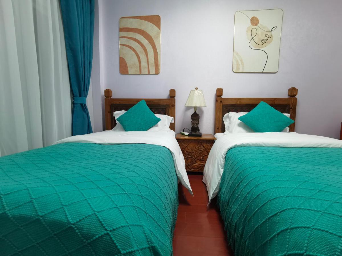 Mama Naxi Guesthouse Лиджанг Екстериор снимка