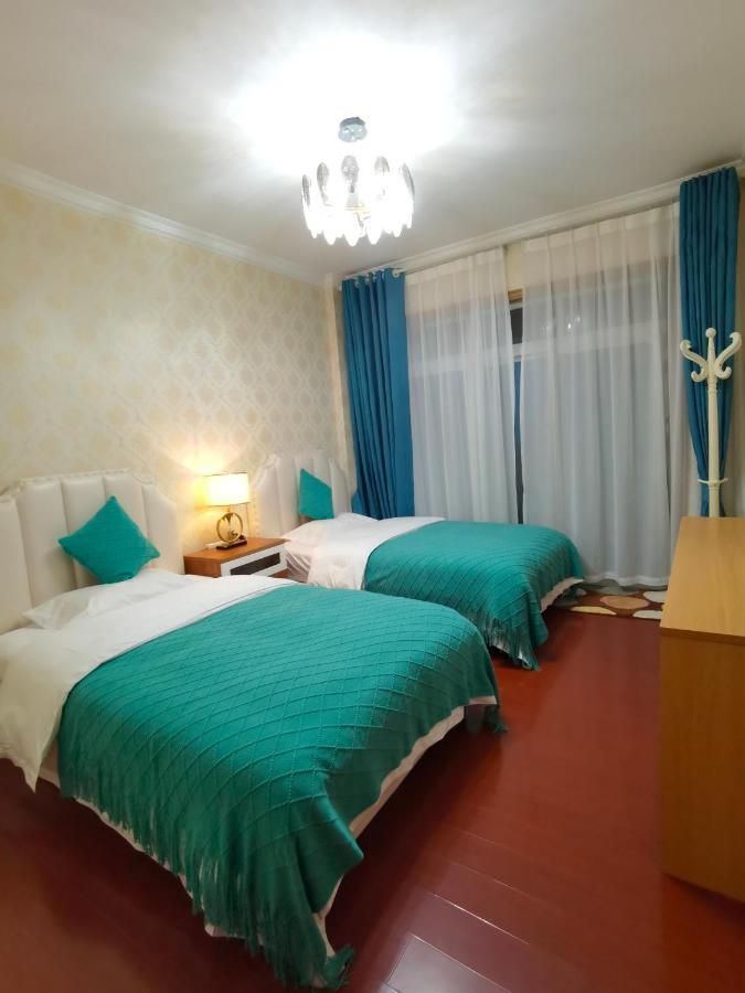 Mama Naxi Guesthouse Лиджанг Екстериор снимка