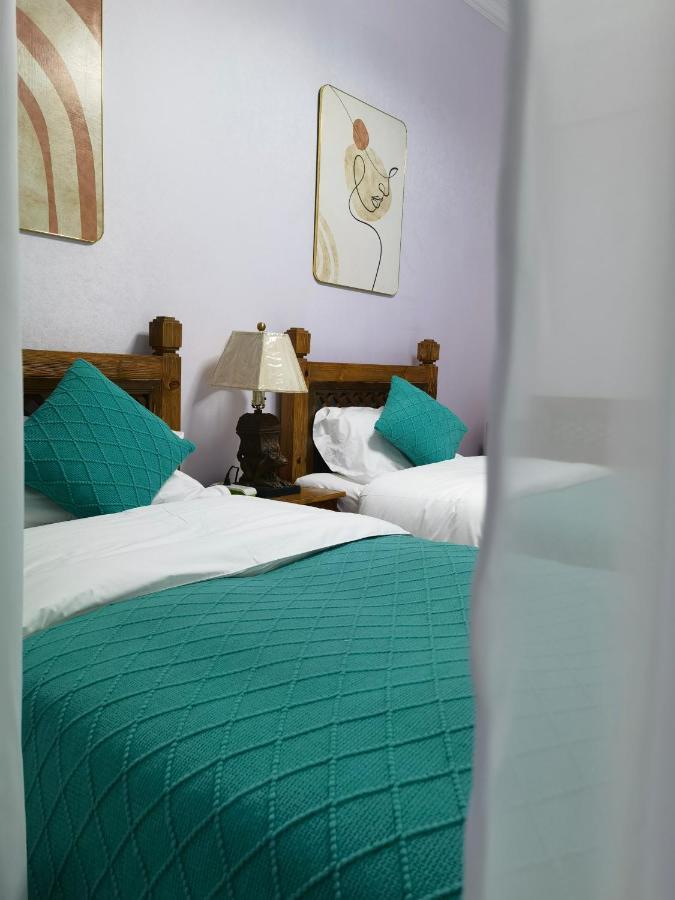 Mama Naxi Guesthouse Лиджанг Екстериор снимка