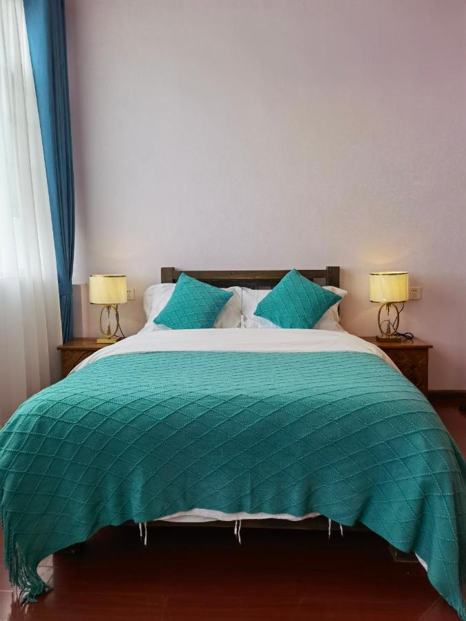 Mama Naxi Guesthouse Лиджанг Екстериор снимка