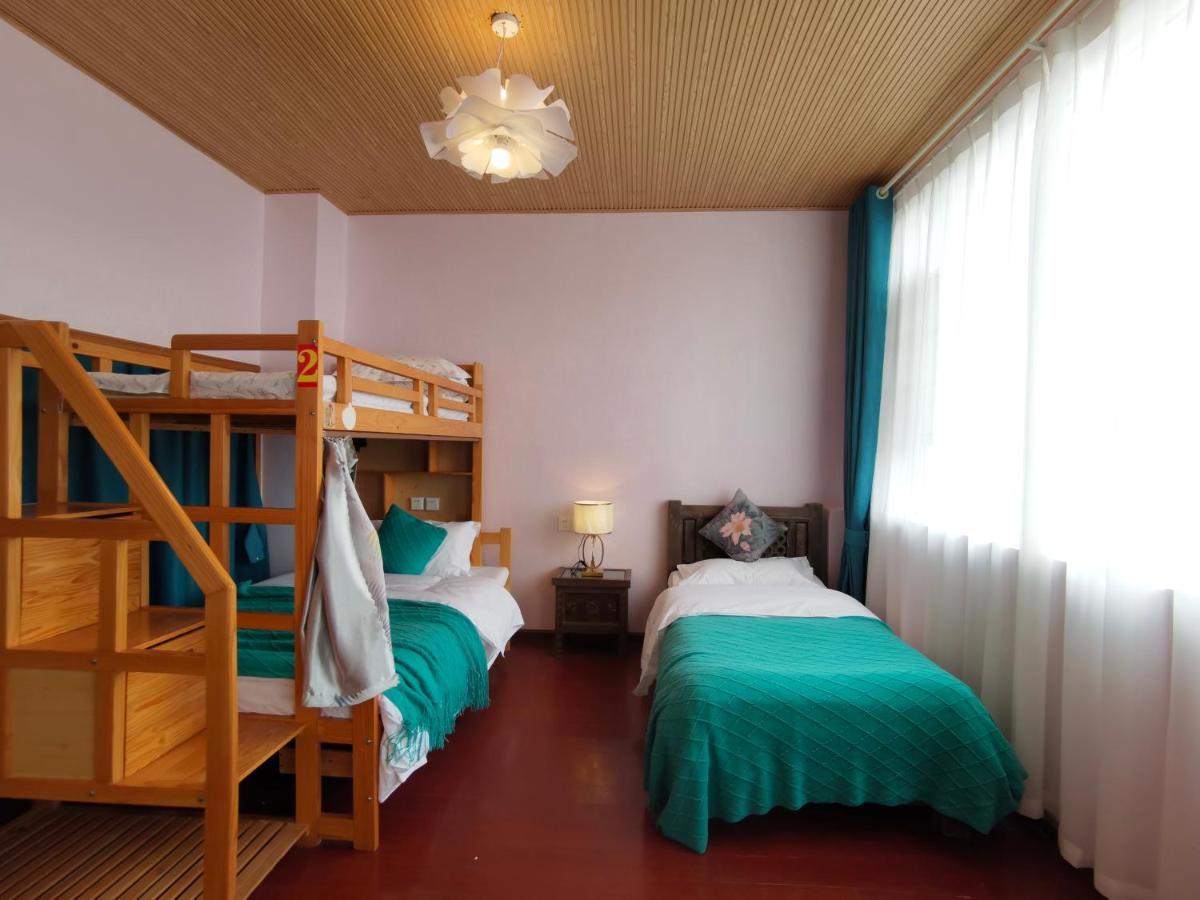 Mama Naxi Guesthouse Лиджанг Екстериор снимка