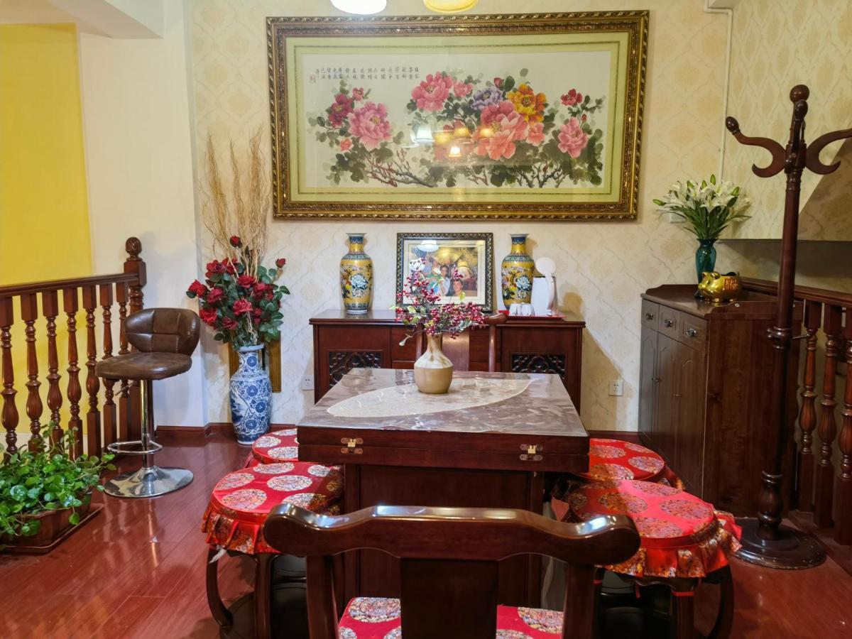 Mama Naxi Guesthouse Лиджанг Екстериор снимка